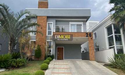 Sobrado com 3 dormitórios para alugar, 250 m² por R$ 17.080,00/mês - Alphaville - Gravataí/RS