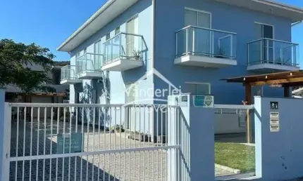 Amplo sobrado com 03 quartos sendo 01 suíte, churrasqueira e garagem, localizado no centrinho da Praia da Pinheira  em Palhoça - SC