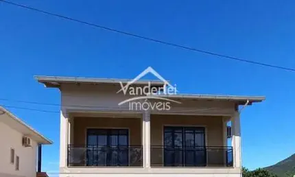 Casa no loteamento com 03 quartos, sendo 01 suíte no bairro Guarda do Cubatão em Palhoça /SC