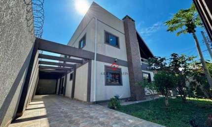 Casa com 5 quartos à venda no Uberaba, Curitiba  por R$ 850.000
