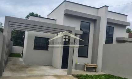 CASA COM SUITE E TERRENO NOS FUNDOS pronta pra morar .