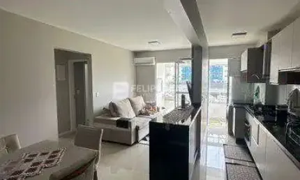 Apartamento com planejados de 2 dormitórios sendo 1 suíte e vaga coberta de garagem em Palhoça