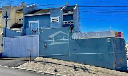 Casa com 3 quartos à venda na Rua Gabirobas, 32, Uberaba, Curitiba por R$ 1.190.000