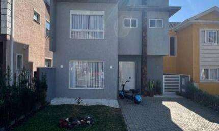 Sobrado com 3 dormitórios para alugar, 178 m² por R$ 7.212,97/mês - Umbará - Curitiba/PR