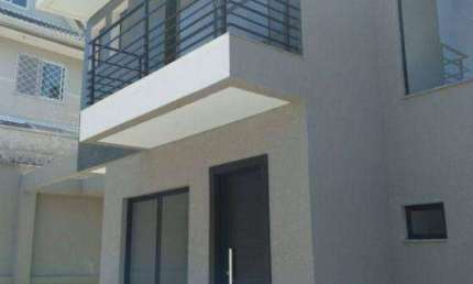 Sobrado com 3 dormitórios à venda, 135 m² por R$ 869.000,00 - Tarumã - Curitiba/PR