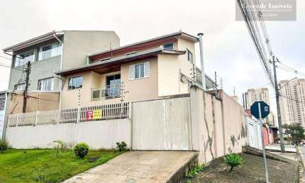 Sobrado com 4 dormitórios à venda, 134 m² por R$ 720.000,00 - Campo Comprido - Curitiba/PR