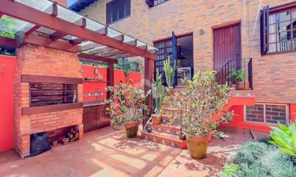 Casa em condomínio fechado com 3 quartos à venda na Rua Jaraguá, 355, Bela Vista, Porto Alegre