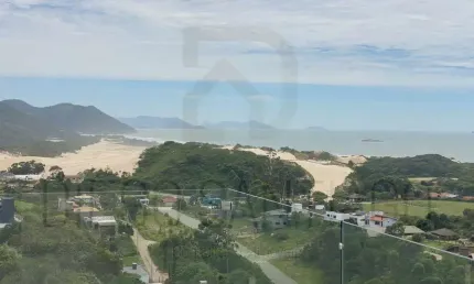 Casa à venda em Garopaba-SC, Areais de Macacu: 3 quartos, 3 suítes, 3 salas, 4 banheiros, 2 vagas, 207m² - Vista deslumbrante de mar e dunas!