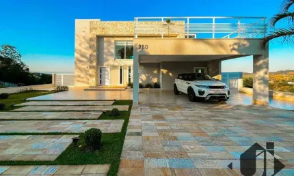 Casa com 4 dormitórios à venda, 628 m² por R$ 4.190.000,00 - Condomínio Altos do Cataguá - Taubaté/SP