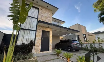 Casa com 3 dormitórios à venda, 214 m² por R$ 1.420.000,00 - Condominio Cataguá Way - Taubaté/SP