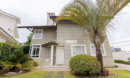Casa em condomínio fechado com 3 suítes e piscina à venda, 290 m² por R$ 2.248.900 - São Lourenço - Curitiba/PR