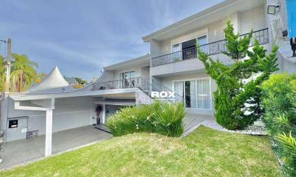 Casa com 4 quartos, porteira fechada, piscina e quintal amplo à venda, 490 m² por R$ 3.799.000 - Santo Inácio, Curitiba/PR