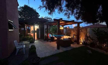 Casa com 3 dormitórios à venda, 280 m² por R$ 2.100.000,00 - Condomínio Residencial Terras do Caribe - Valinhos/SP
