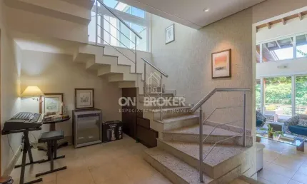 Casa com 4 dormitórios à venda, 391 m² por R$ 4.380.000 - Condomínio Moinho do Vento - Valinhos/SP