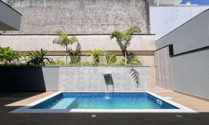 Casa com 3 dormitórios à venda, 231 m² por R$ 1.970.000 - Condomínio Portal do Jequitibá - Valinhos/SP