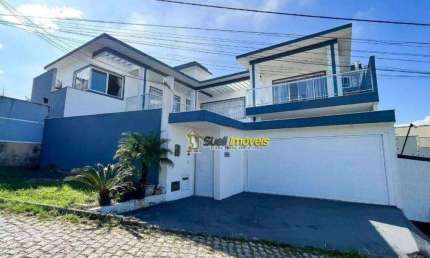 Casa com 4 dormitórios, 302 m² - venda por R$ 1.300.000,00 ou aluguel por R$ 7.200,00/mês - Jardim Guanabara - Macaé/RJ