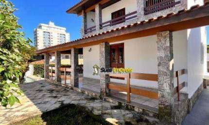 Casa com 3 dormitórios, 260 m² - venda por R$ 1.400.000,00 ou aluguel por R$ 6.734,57/mês - Glória - Macaé/RJ