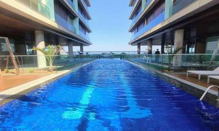Apartamento Flat de Luxo, planejado, vista lateral Lagoa e Mar, sol matinal, no Grand Hyatt na Praia da Barra da Tijuca