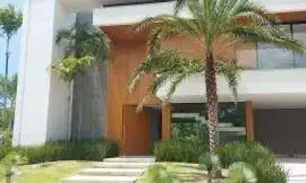 Mansão de alto padrão, em grande lote de 900m², contemporânea, 5 suítes, sótão amplo mais terraço, no riviera da lagoa.