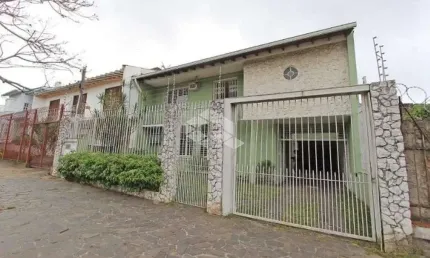 Casa com 5 quartos à venda na Rua Guilherme Alves, 154, Partenon, Porto Alegre