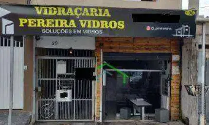 Excelente terreno com 4 casas, salão comercial e garagem para renda - ótima localização!