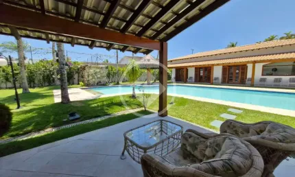 Deliciosa Casa Jardim Acapulco térrea e com ampla área de convivência Guarujá SP codigo: 112054