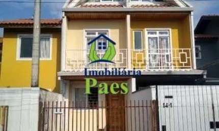 Casa com 3 quartos à venda no Uberaba, Curitiba  por R$ 700.000