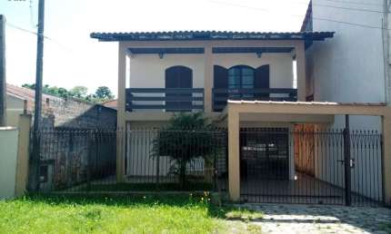 Casa com 4 quartos à venda no Cajuru, Curitiba  por R$ 550.000