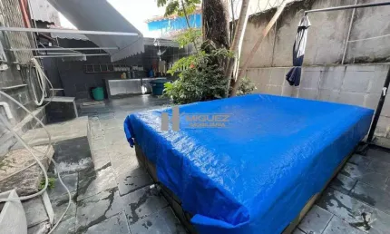 Espaço e localização: casa duplex à venda na Tijuca com 4 quartos, 2 cozinhas, piscina, área externa e garagem. Rua Bom Pastor, a poucos minutos do metrô Uruguai.