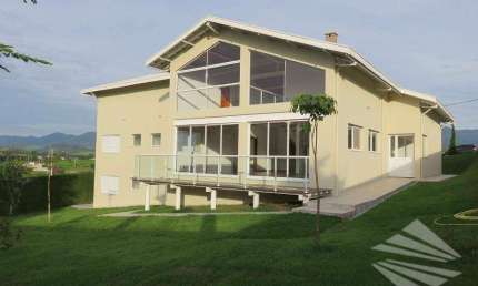 Casa com 4 dormitórios à venda, 290 m² - Condomínio Village da Serra - Tremembé/SP