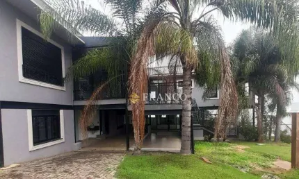 Sobrado com 4 dormitórios, 452,20m² - venda ou aluguel - Condomínio Village da Serra - Tremembé/SP