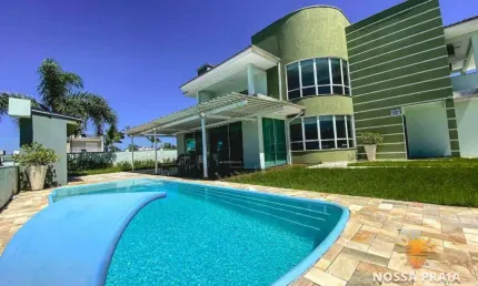 Sobrado em condominio fechado FRENTE MAR com 6 dormitórios à venda, 350m² por R$ 1.999.000 - Volta Ao Mundo II - Itapoá/SC