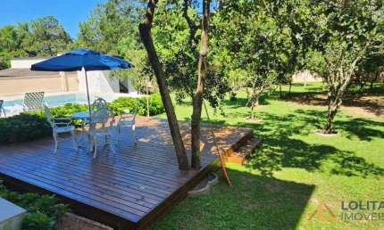 Casa à venda em Imbituba/SC,  com 3 suítes e 4 vagas de garagem