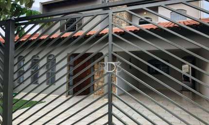Casa com 4 dormitórios à venda, 290 m² por R$ 899.000,00 - Jardim Tarumã - Londrina/PR