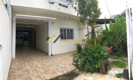 SOBRADO NO CENTRO DE PINHAIS! 4 QUARTOS, SUÍTE, 4 VAGAS DE GAR.