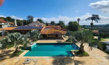 Casa térrea para venda em condomínio fechado, Cotia, com 6 dormitórios, sendo 4 suítes, edícula, piscina, academia e área gourmet.