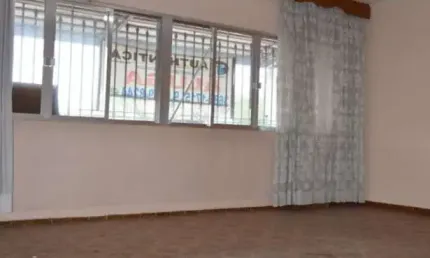 Casa assobradada com 3 suítes, com excelente localização.