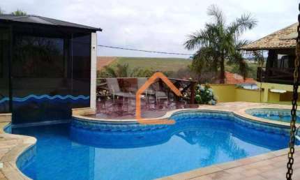 Casa com 4 dormitórios à venda, 660 m² por R$ 1.500.000 - Presidente Juscelino - Pouso Alegre/MG