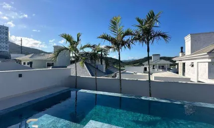 Casa alto padrão no bairro pedra branca com 3 dormitórios (1 suíte)