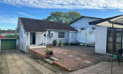 Casa com 3 quartos à venda na Rua Padre João Batista Reus, 3220, Vila Conceição, Porto Alegre por R$ 500.000