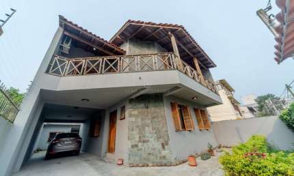 Casa com 3 quartos à venda na Rua Monte Arraes, --, Nonoai, Porto Alegre por R$ 954.000