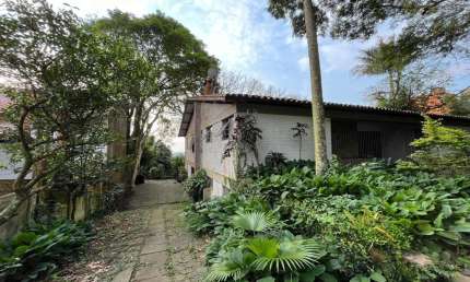 Casa com 4 quartos à venda na Rua Coronel Gomes de Carvalho, 410, Sétimo Céu, Porto Alegre por R$ 1.390.000
