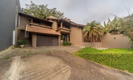 Casa com 3 quartos à venda na Rua Edgar Luiz Schneider, --, Jardim Isabel, Porto Alegre por R$ 1.450.000