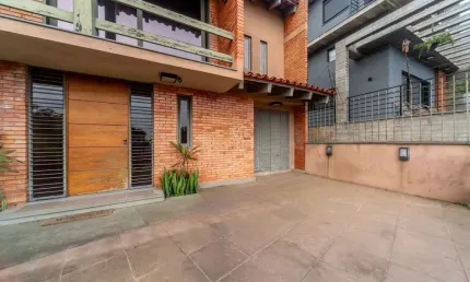 Casa com 3 quartos à venda na Rua Edgar Luiz Schneider, --, Jardim Isabel, Porto Alegre por R$ 1.290.000