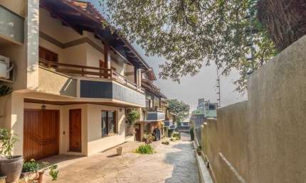 Casa em condomínio fechado com 3 quartos à venda na Rua Jaguari, 910, Cristal, Porto Alegre por R$ 780.000