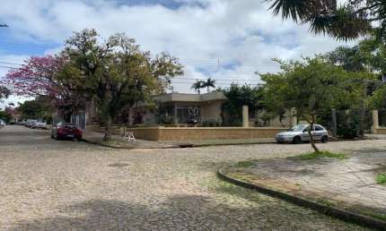 Casa com 4 quartos à venda na Rua Guaraum, --, Vila Assunção, Porto Alegre por R$ 2.200.000