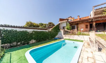 Casa com 3 quartos à venda na Rua General Rondon, 1395, Tristeza, Porto Alegre por R$ 1.500.000