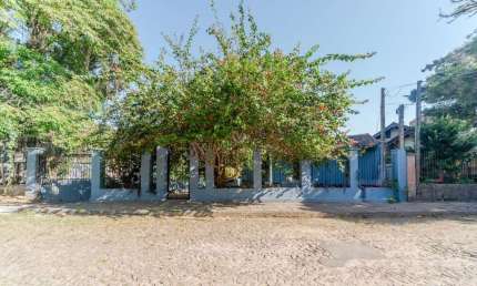 Casa com 3 quartos à venda na Rua Simão Bolívar, 455, Vila Conceição, Porto Alegre por R$ 950.000