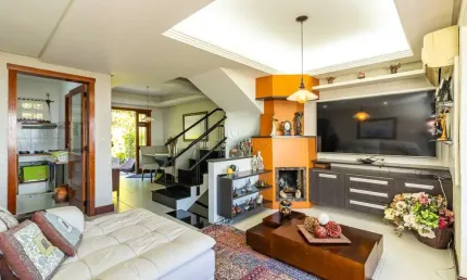 Casa em condomínio fechado com 2 quartos à venda na Avenida Wenceslau Escobar, 3714, Tristeza, Porto Alegre por R$ 900.000