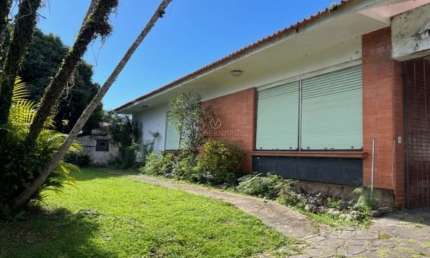 Casa com 3 quartos à venda na Rua Sargento Nicolau Dias de Farias, 426, Tristeza, Porto Alegre por R$ 1.650.000